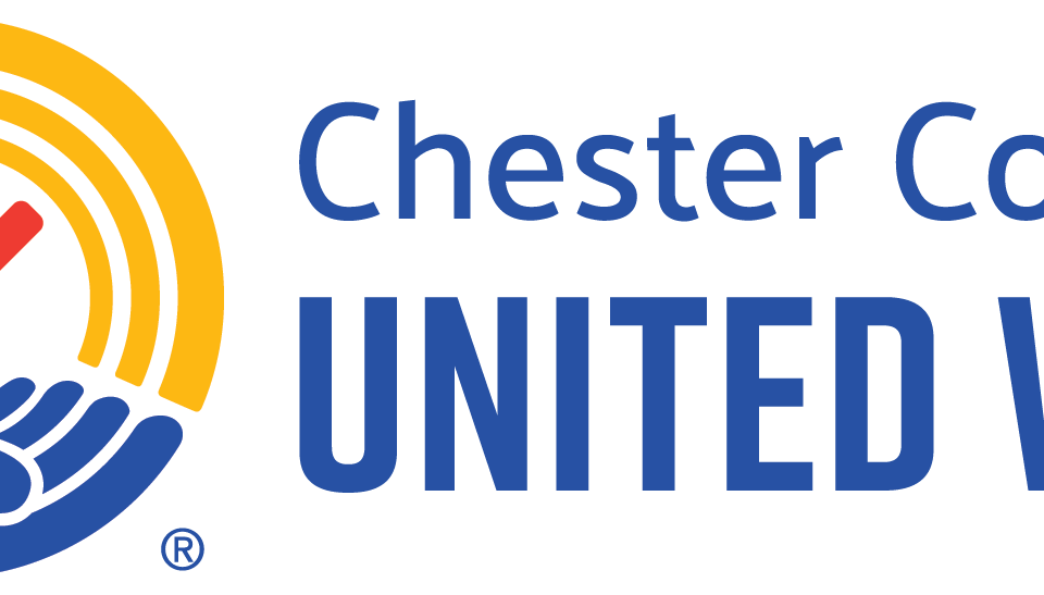 Chester County United Way logo with a blue hand holding a red person symbol, surrounded by yellow arcs, and the organization’s name in blue text on a white background.